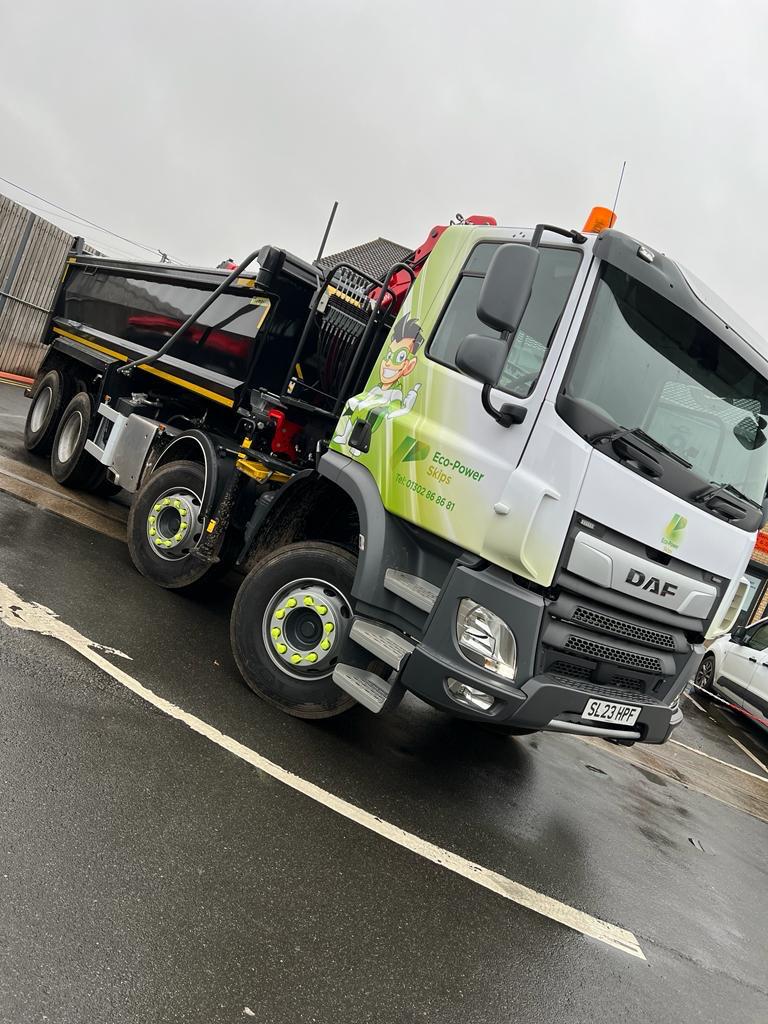 Commercial skip truck with full fleet livery by ATZ Group